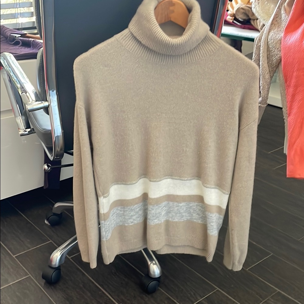 Woman’s  Beige Turtleneck Sweater
